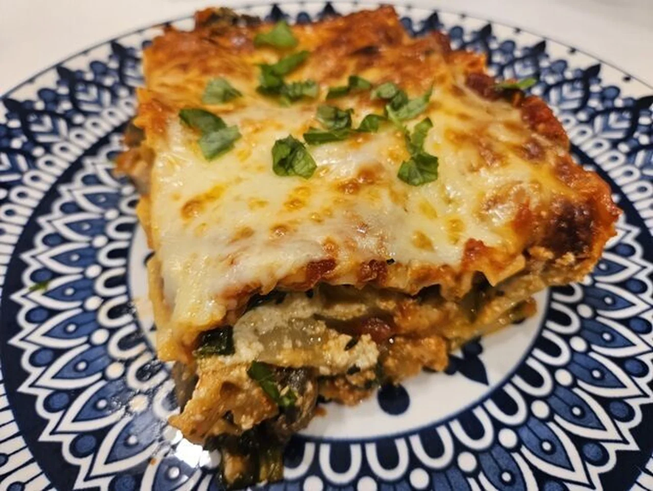 Lasagne au poulet, champignons et épinards