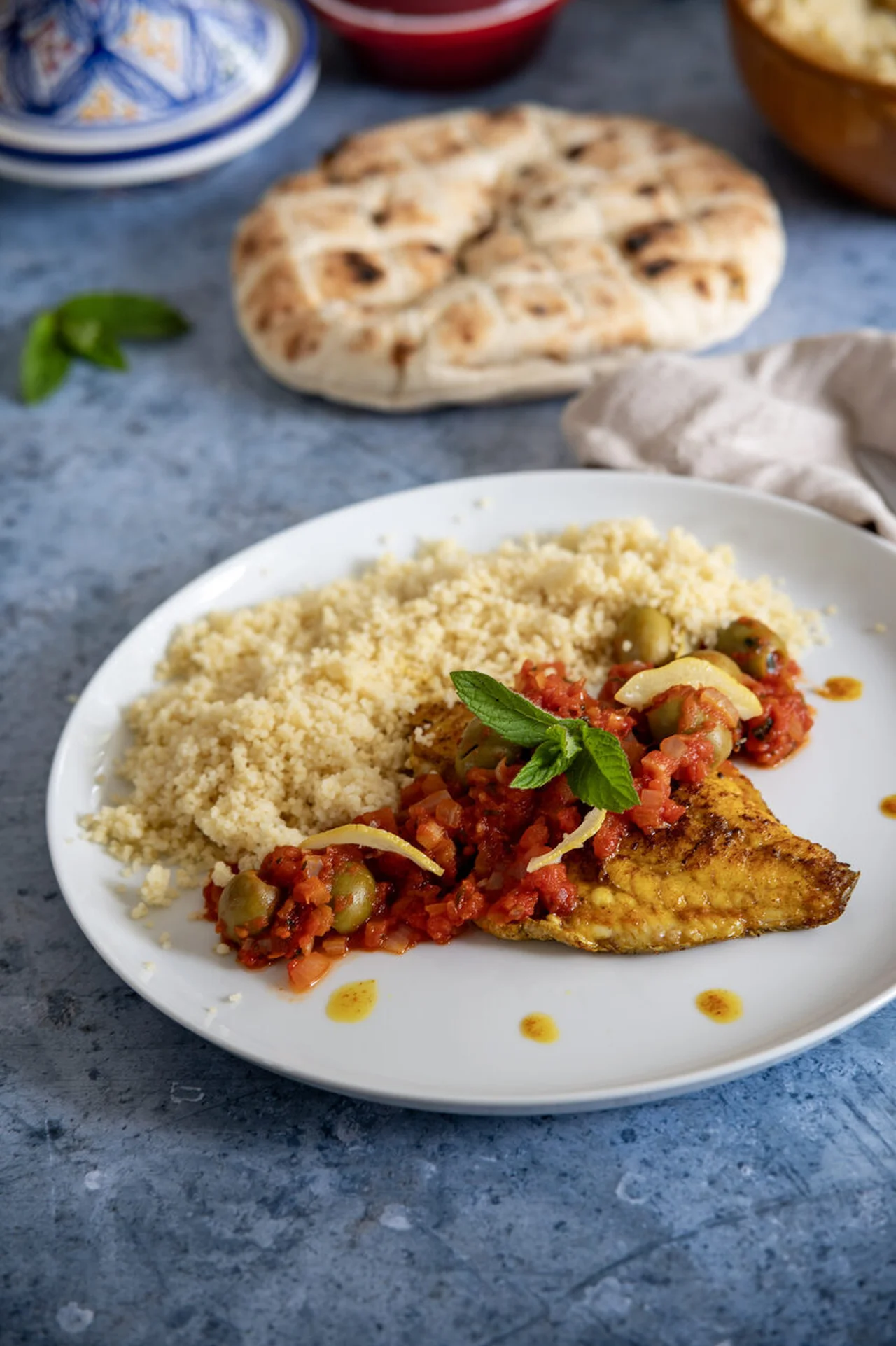 Filet de dorade aux tomates, citrons confits