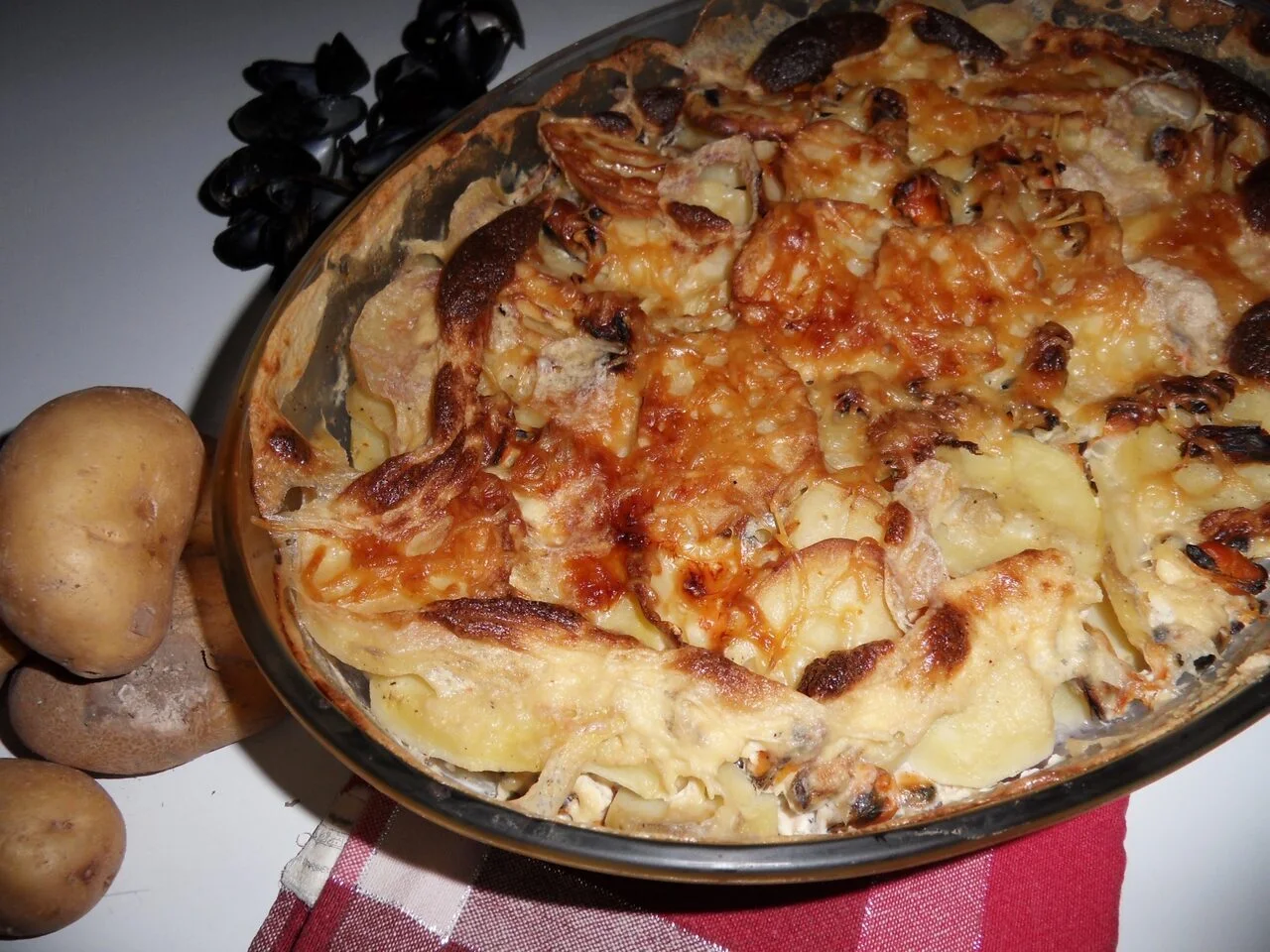 Gratin de pommes de terre aux restes de moules marinières
