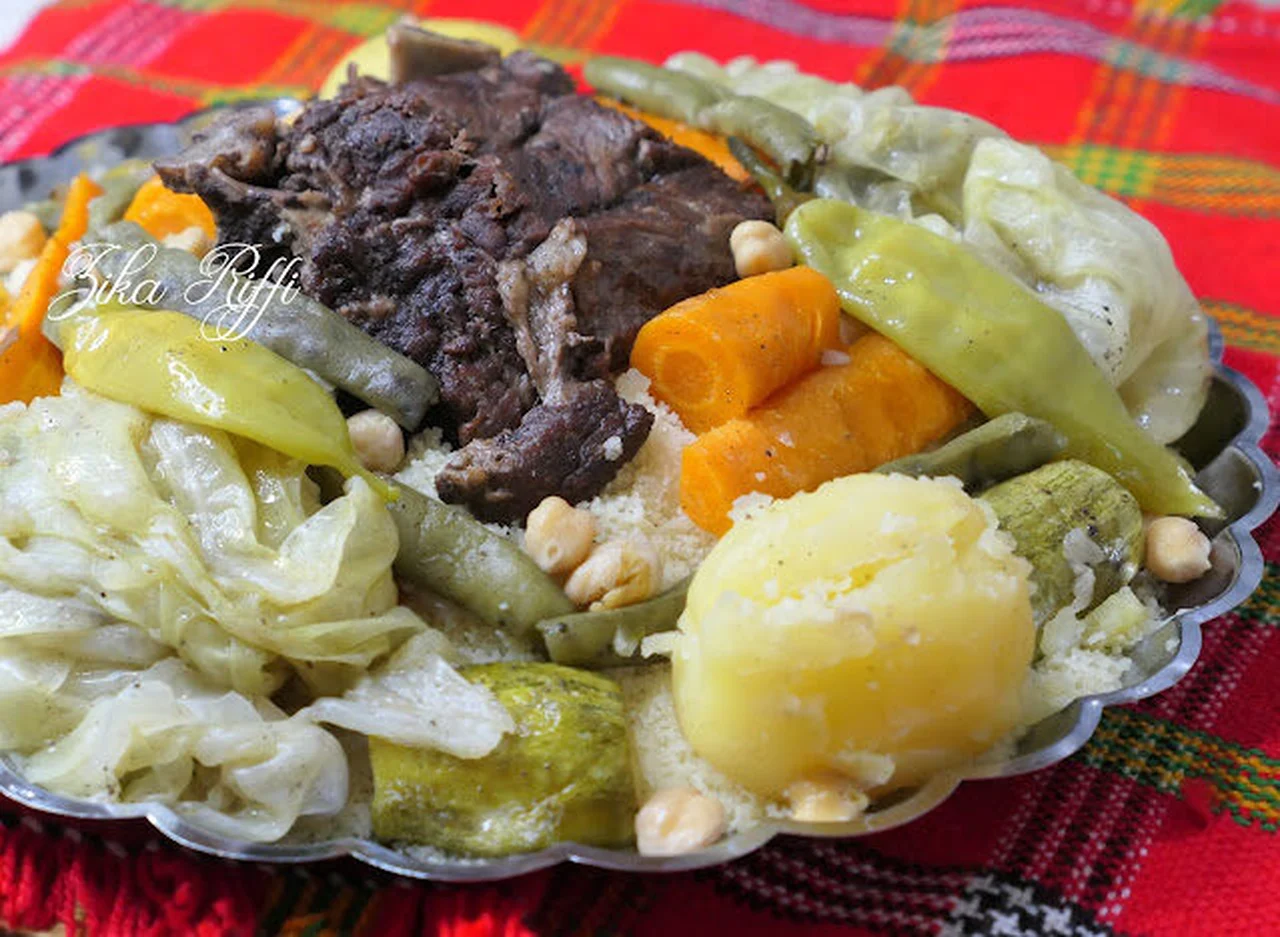 Couscous roulé à l'agneau au chou et légumes