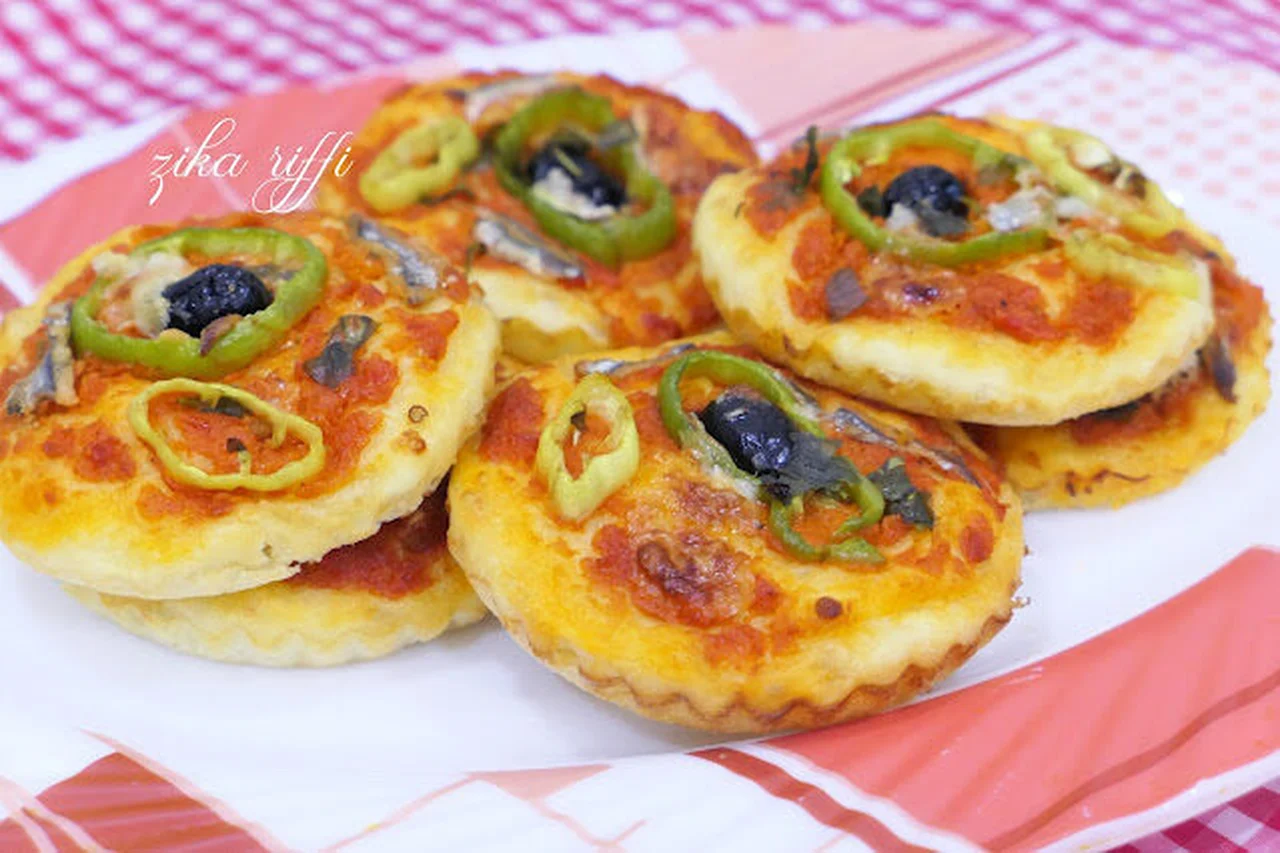 Mini pizza aux anchois, poivron et piment fort