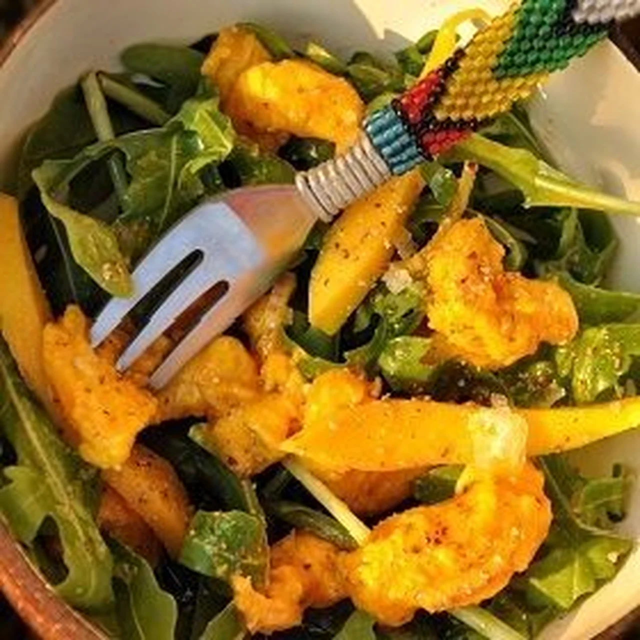 Ceviche de loup à la mangue, curcuma et poivre de Kampot