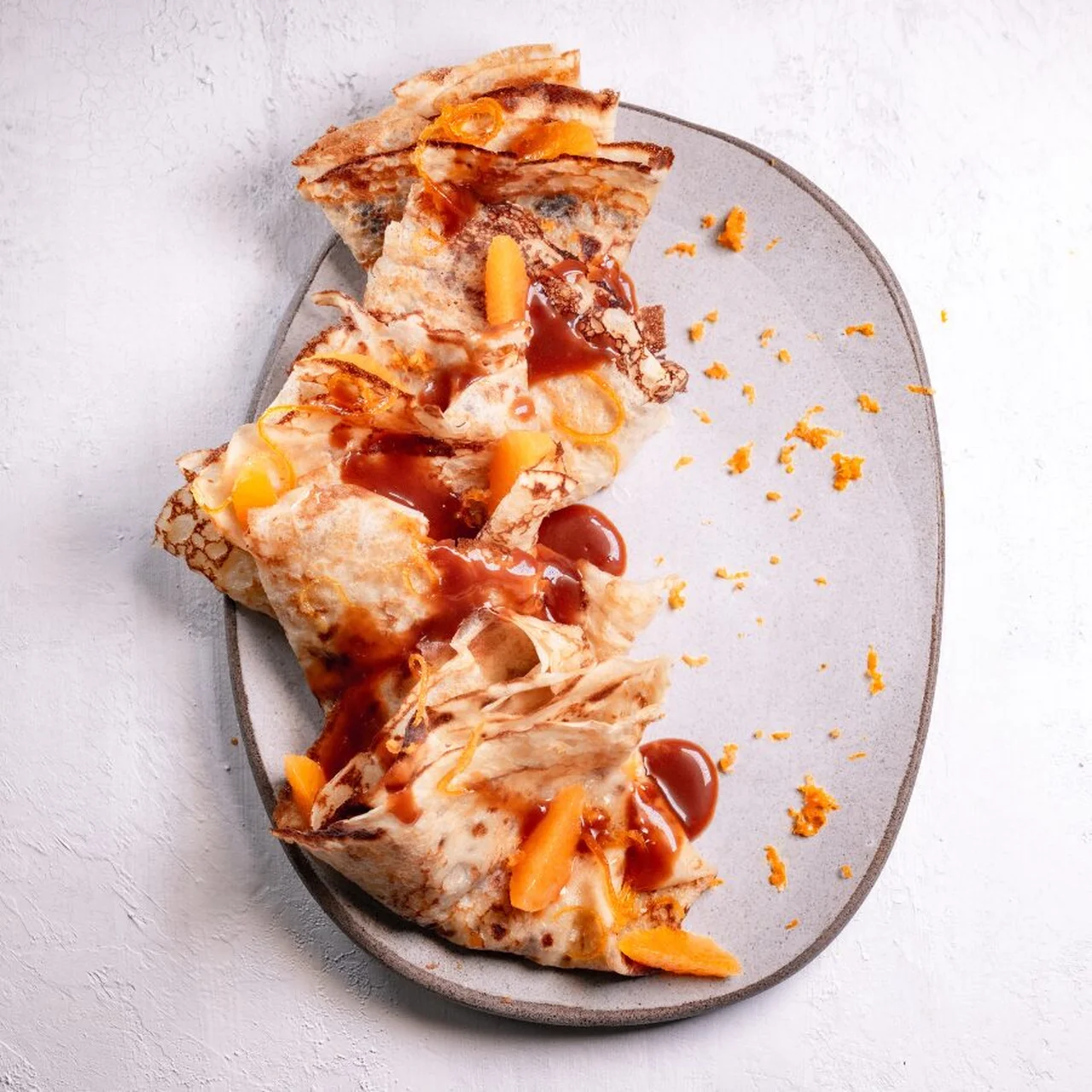 Crêpes aux zestes d'oranges et de mandarines