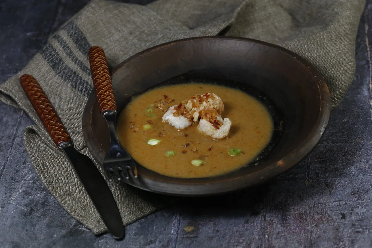 Langoustine à la bisque et poudre de jambon