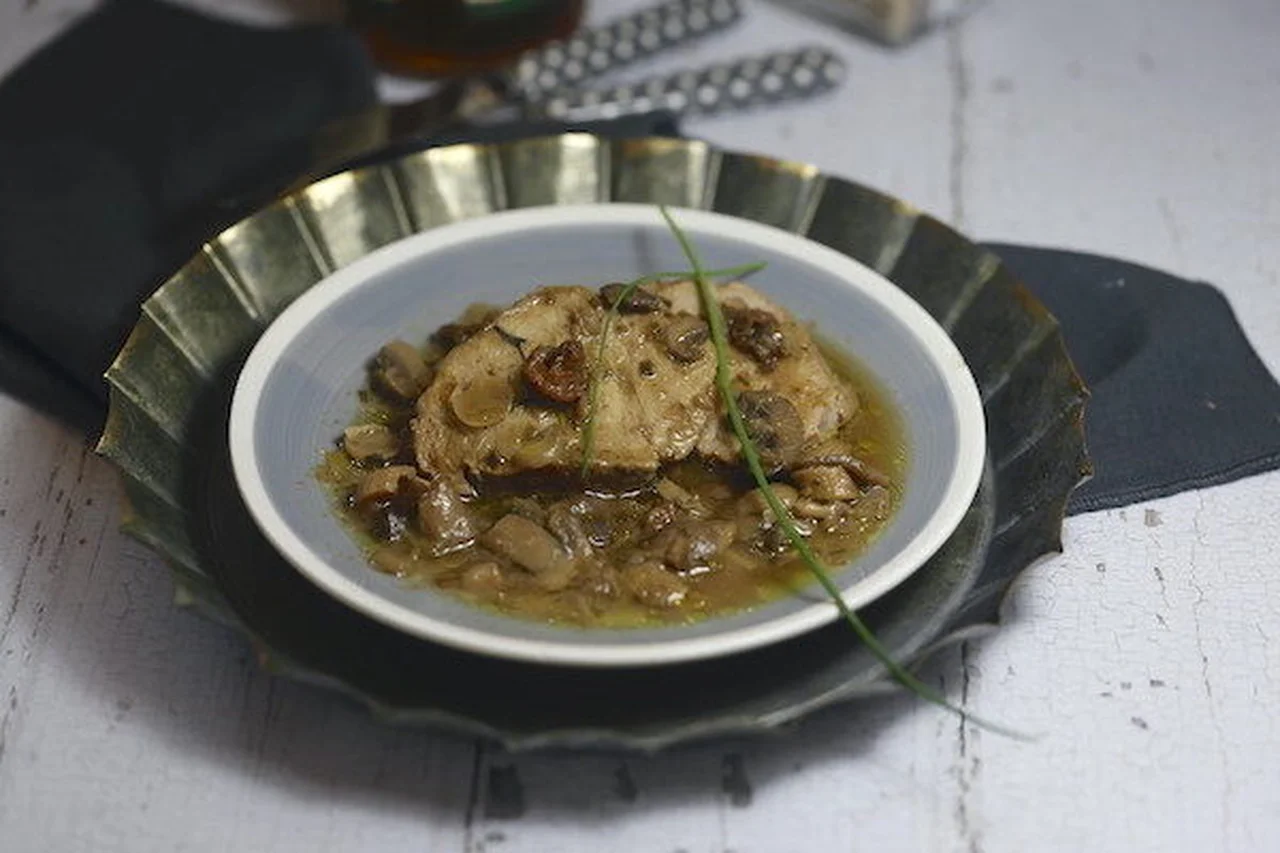 Rôti de veau flambé au whisky et champignons