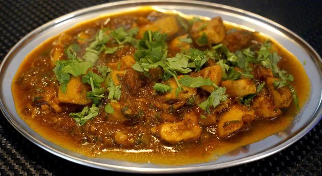 Lamelles d'encornet sauce tomate au vin blanc