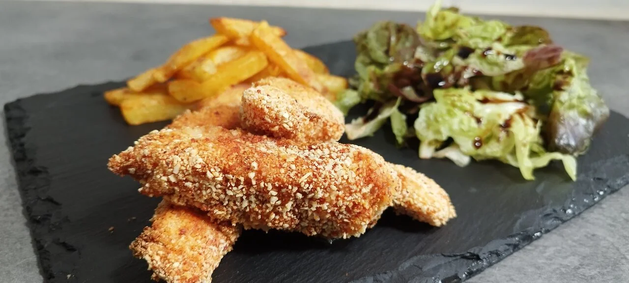 Tenders de poulet et frites au four