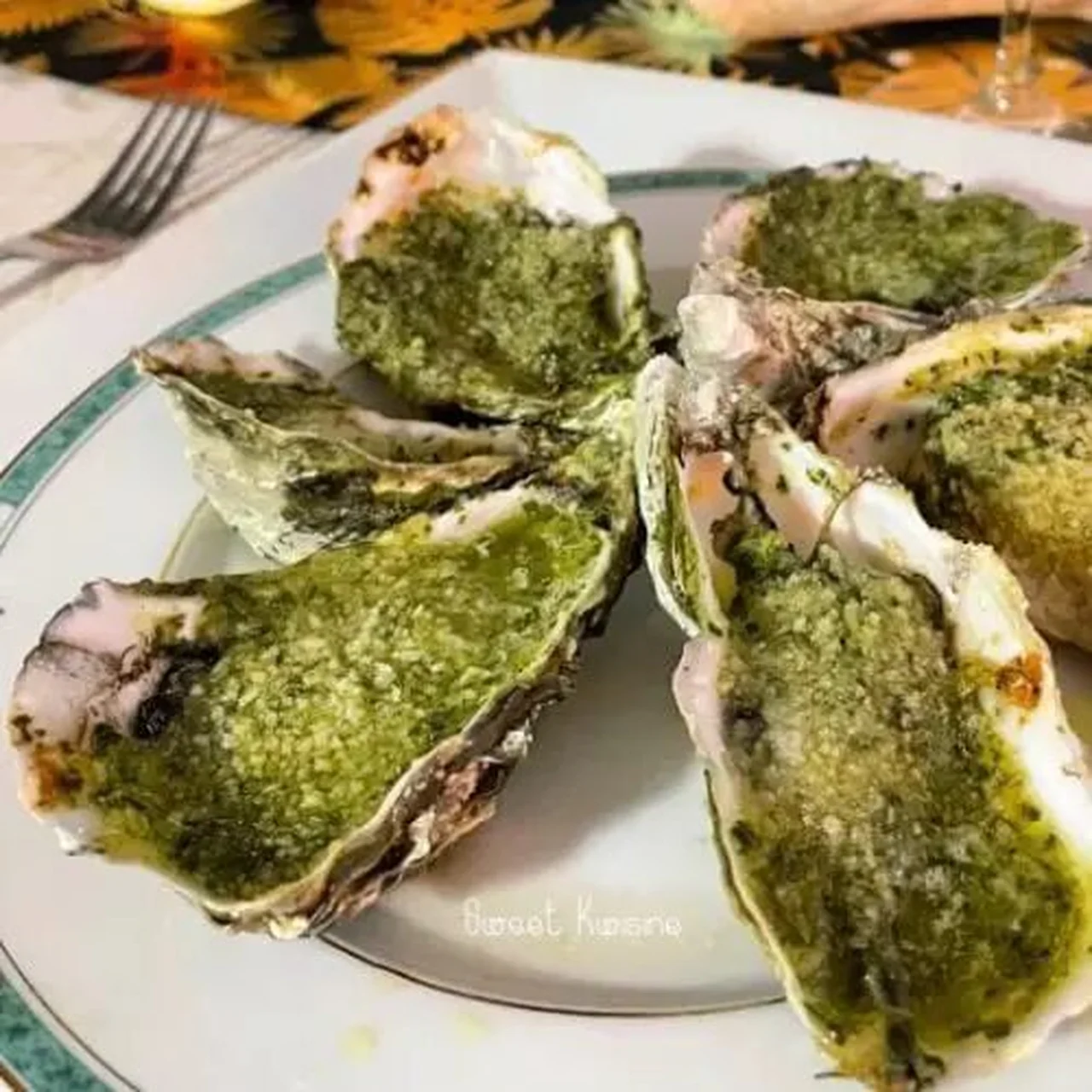 Les huîtres chaudes au beurre d'escargot