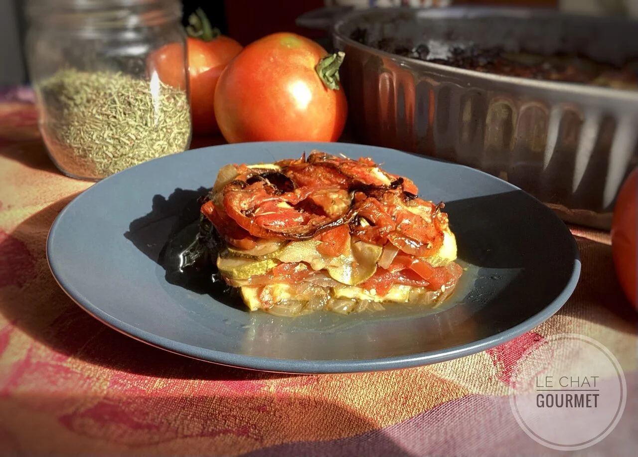 Gratin de courgettes, tomates et oignons confits