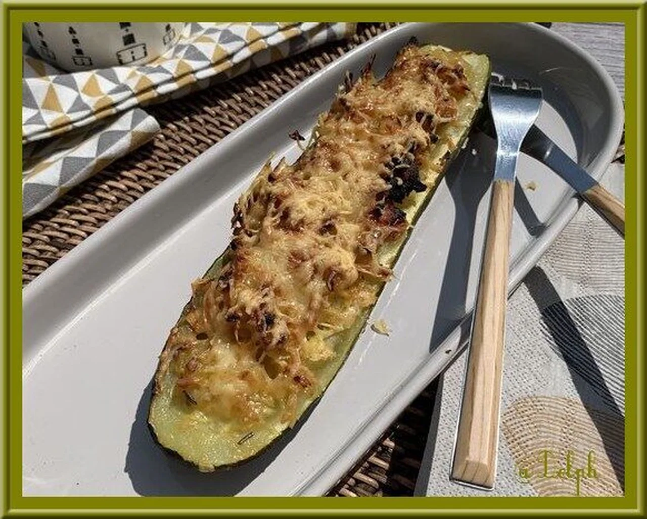 Courgette farcie à l'oignon et bacon